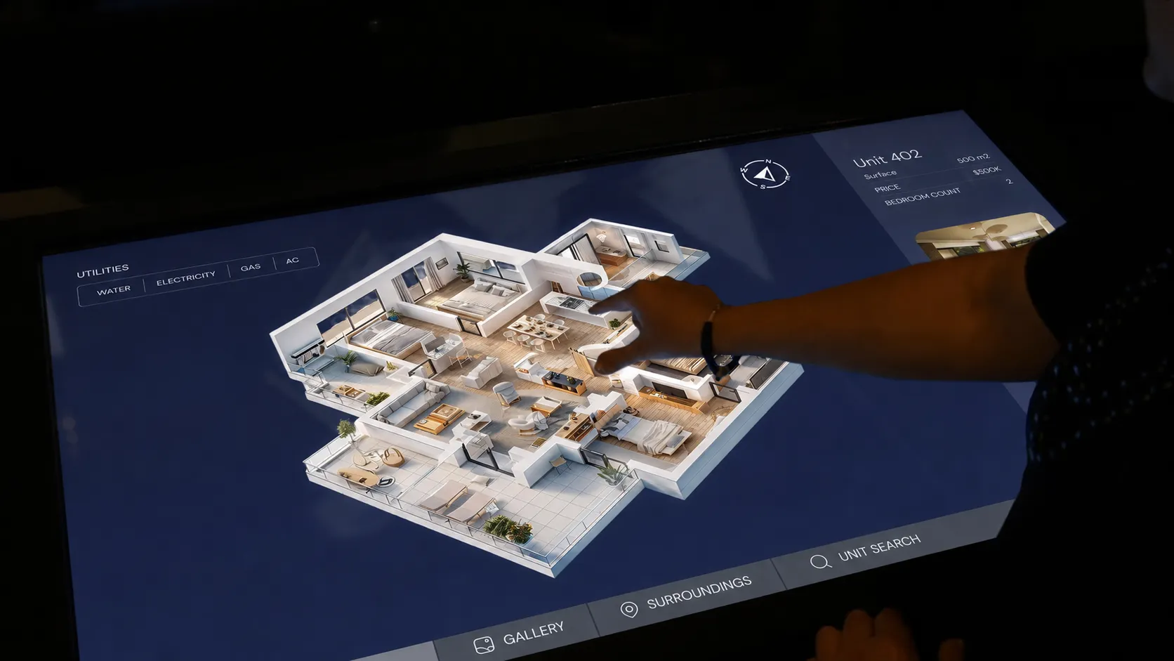 Touchscreen kiosk showing a 3D floor plan of a selected unit