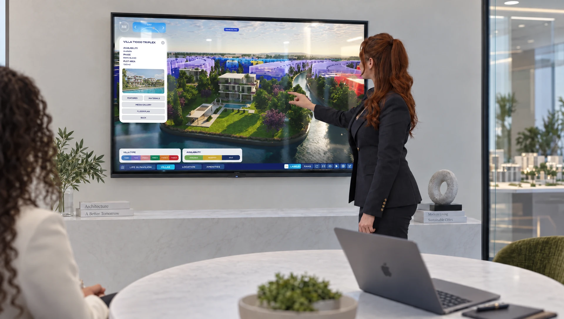 A sales advisor presenting the masterplan on a large display